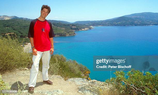 Axel Becker, Urlaub in der Toscana, Insel Elba, Italien, Europa, Meer, Klippe, Abhang, Landschaft, lächeln, Volksmusik-Sänger, SV/RW,