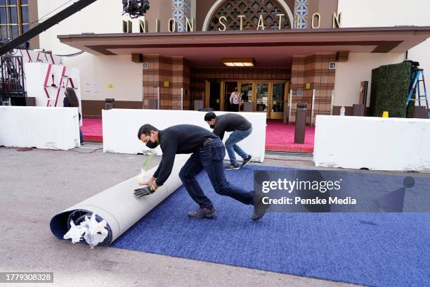 Staff roll out a carpet prior to the start of the Oscars on Sunday, April 25 at Union Station in Los Angeles.