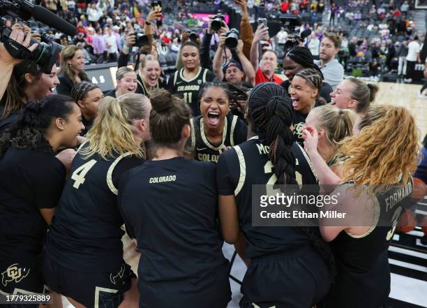 Tameiya Sadler of the Colorado Buffaloes and her teammates celebrate their 92-78 victory over the LSU Lady Tigers in the Naismith Basketball Hall of...