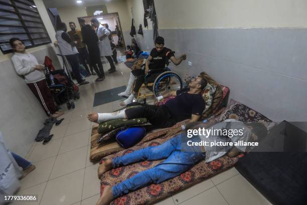 November 2023, Palestinian Territories, Khan Yunis: Atef Al-Helou , from Shujaiya neighbourhood in Gaza City, stays with his relatives inside Nasser...