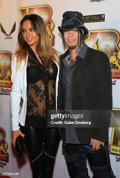 Model Nathalia Henao and guitarist Dj Ashba of Guns N' Roses arrive at the 2013 Vegas Rocks! magazine music awards at The Joint inside the Hard Rock...