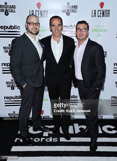 Editorial Director at Billboard, Bill Werde, Founder, Chairman and CEO of Republic Records, Monte Lipman and President of Billboard John Amato attend...
