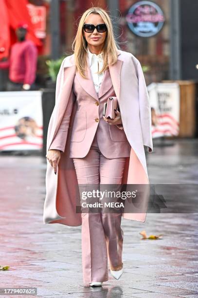 Amanda Holden is seen leaving Global Studios on November 13, 2023 in London, United Kingdom.