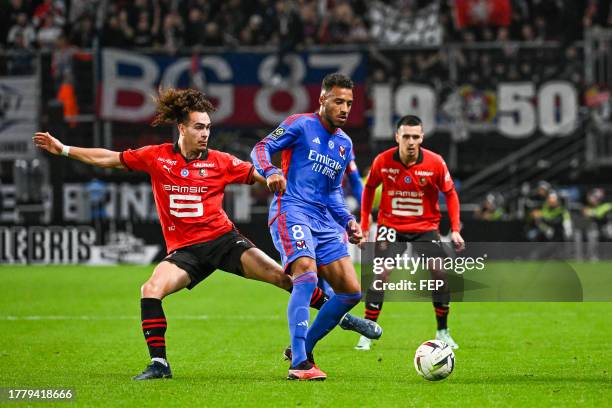 Corentin TOLISSO of Lyon and Arthur THEATE of Rennes during the Ligue 1 match between Stade Rennais Football Club and Olympique Lyonnais at Roazhon...