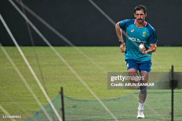 Australia's Mitchell Starc bowls in the nets during a practice session ahead of their 2023 ICC Men's Cricket World Cup one-day international...