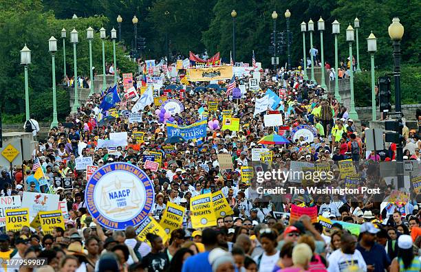 Overview of thousands marching on the Kutz Bridge during the 50th Anniversary of March On Washington in Washington, DC on August 24, 2013. The March...
