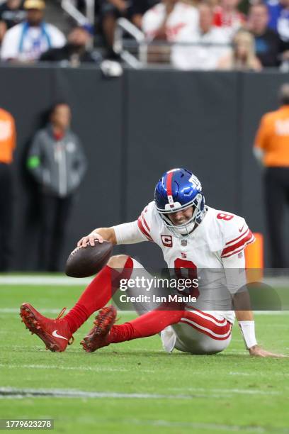 Daniel Jones of the New York Giants reacts after falling during the second quarter against the Las Vegas Raiders at Allegiant Stadium on November 05,...