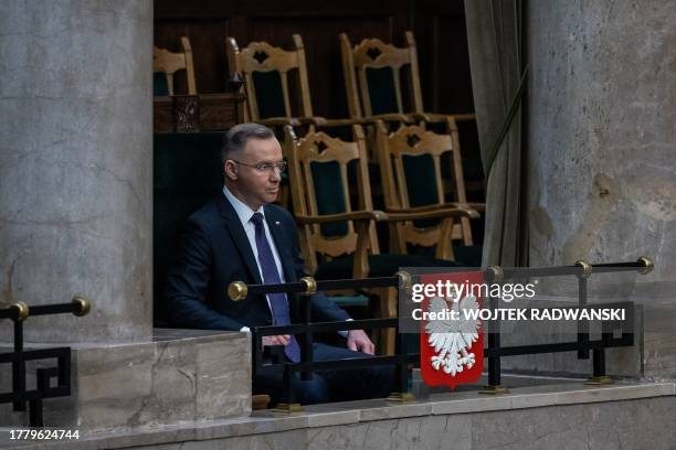 Polish President Andrzej duda listens during the inauguration session of the Polish Parliament in Warsaw on November 13, 2023. The ruling Law and...