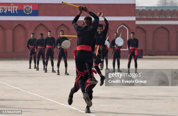 November 09 Srinagar Kashmir, India : Indian Border Security Force soldiers shows their skills during a passing out parade in Humhama, on the...