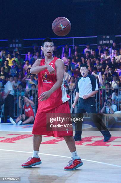 American professional basketball players Jeremy Lin of the Houston Rockets meets fans at MasterCard Center on August 24, 2013 in Beijing, China.