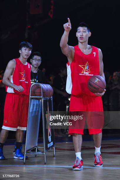 American professional basketball players Jeremy Lin of the Houston Rockets meets fans at MasterCard Center on August 24, 2013 in Beijing, China.