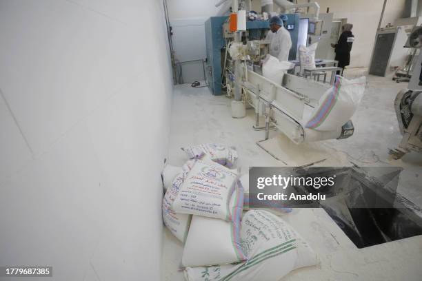 View of Al Salam Flour Plant, which has difficulty in finding fuel to keep the generators running, tries to continue work as the Israeli attacks on...