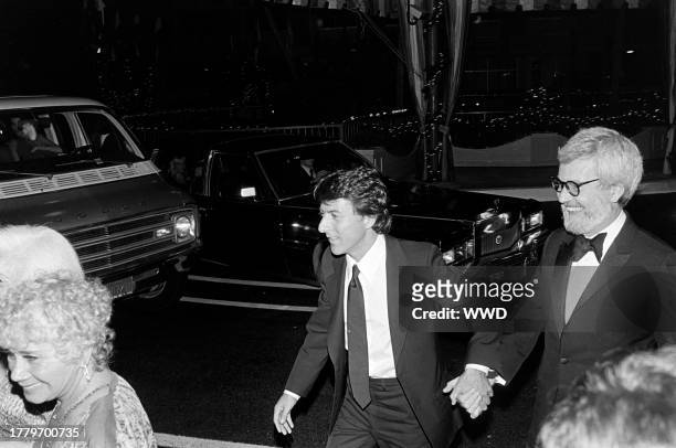 Dustin Hoffman and Robert Benton attend an event at the Los Angeles Children's Museum in Los Angeles, California, on December 7, 1979.