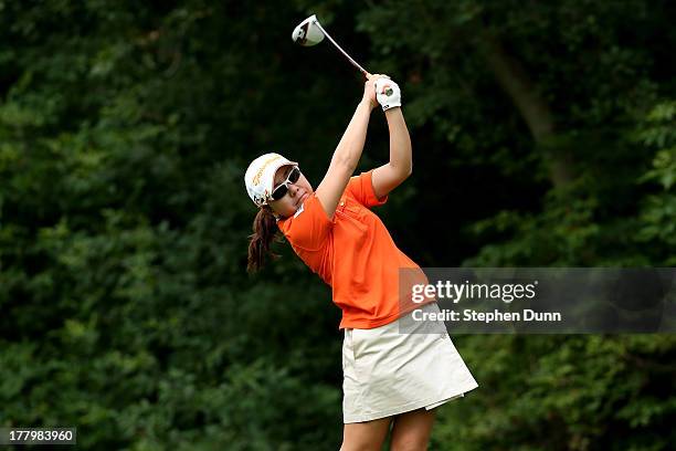 Mika Miyazato of Japan hits her tee shot on the fifth hole during the final round of the CN Canadian Women's Open at Royal Mayfair Golf Club on...