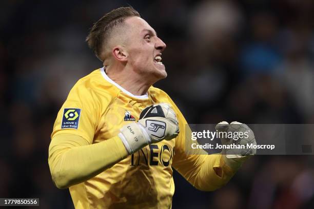 Marcin Bulka of OGC Nice celebrates after team mate Jeremie Boga scored to give the side a 1-0 lead during the Ligue 1 Uber Eats match between OGC...