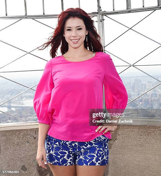 Actress Jillian Rose Reed visits The Empire State Building on August 26, 2013 in New York City.