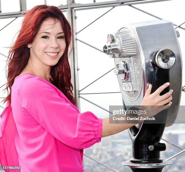 Actress Jillian Rose Reed visits The Empire State Building on August 26, 2013 in New York City.