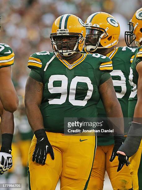 Raji of the Green Bay Packers awaits the start of play against the Arizona Cardinals at Lambeau Field on August 9, 2013 in Green Bay, Wisconsin. The...