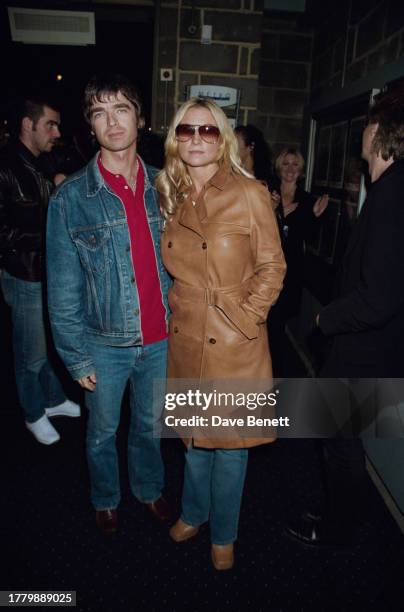 English musician Noel Gallagher and Meg Mathews attend the Raindance Film Festival at the Metro cinema, Soho, London, 9th October 1999.