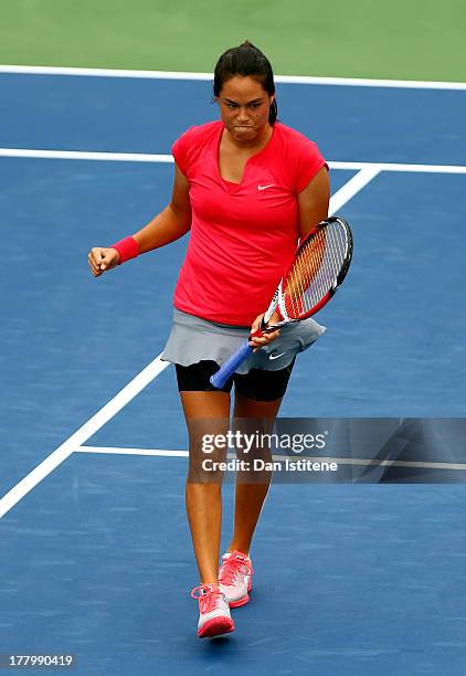 Jamie Hampton of United States of America celebrates the first set point against Lara Arruabarrena of Spain during their first round match on Day One...