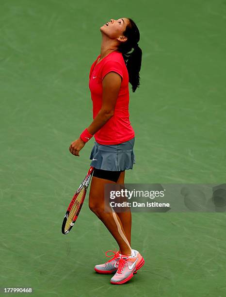Jamie Hampton of United States of America reacts against Lara Arruabarrena of Spain during their first round match on Day One of the 2013 US Open at...
