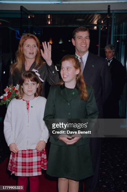 Sarah, Duchess of York, Prince Andrew, Duke of York, and their children Princess Eugenie and Princess Beatrice attend the premiere for Brad Bird's...