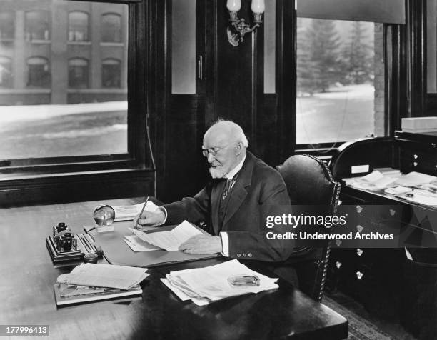 Industrialist, philanthropist and founder of the Royal Worcester Corset Company David Hale Fanning in his office, Worcester, Massachusetts, c. 1911.