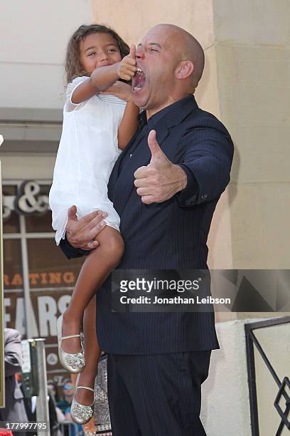 Vin Diesel and daughter, Hania Riley attend the ceremony honoring him with a star on The Hollywood Walk of Fame held on August 26, 2013 in Hollywood,...