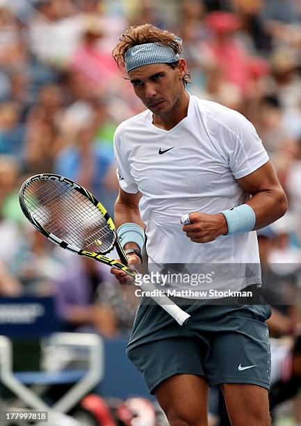 Rafael Nadal of Spain looks on against Ryan Harrison of the United States during their first round men's singles match on Day One of the 2013 US Open...