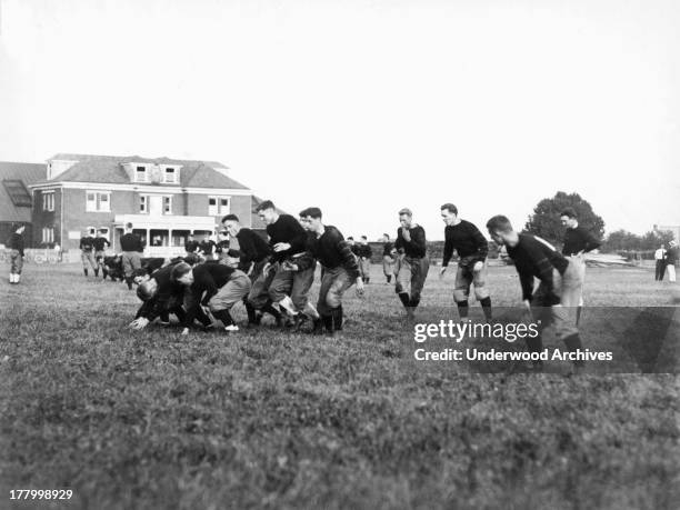 The Princeton University's football team's offensive line at practice, Princeton, New Jersey, September 17, 1912.