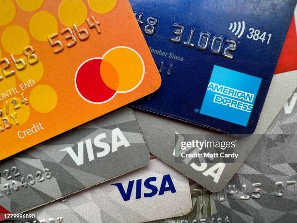In this photo illustration the Visa, Mastercard and American Express logos are seen on credit and debit cards on November 5, 2023 in Bath, England....