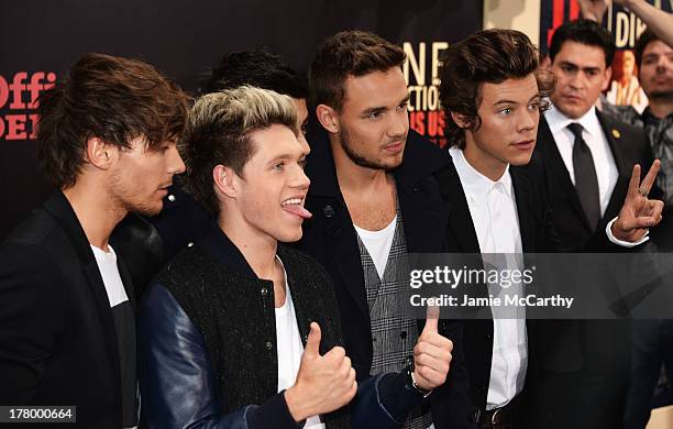 Louis Tomlinson, Niall Horan, Zayn Malik, Liam Payne and Harry Styles attend the world premiere of "One Direction: This Is Us" at the Ziegfeld...