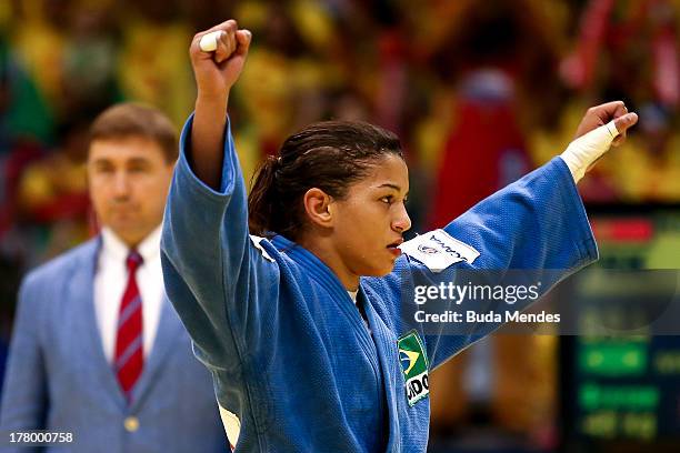 Sarah Menezes of Brazil celebrates a bronze medal in the -48 kg category during the World Judo Championships at the Maracanazinho gymnasium on August...