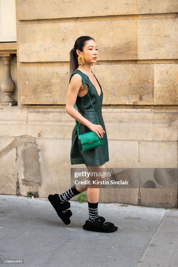 Street Style - Paris Fashion Week - Womenswear Spring/Summer 2024 - Day Three