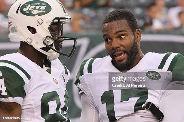 Wide Receiver Bryalon Edwards and Wide Receiver Stephen Hill of the New York Jets talk during the game against the Jacksonville Jaguars at MetLife...