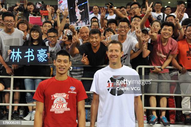 American professional basketball players Jeremy Lin of the Houston Rockets and Steve Novak of the Toronto Raptors attend a basketball training camp...