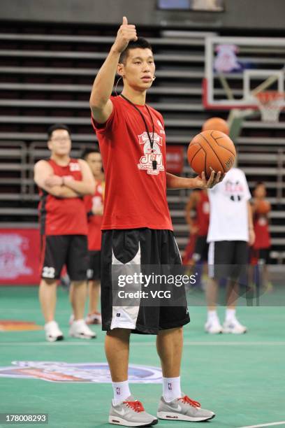 American professional basketball player Jeremy Lin of the Houston Rockets attends a basketball training camp at MasterCard Center on August 26, 2013...