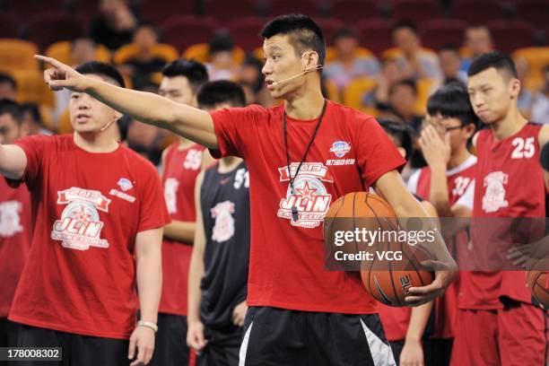 American professional basketball player Jeremy Lin of the Houston Rockets attends a basketball training camp at MasterCard Center on August 26, 2013...