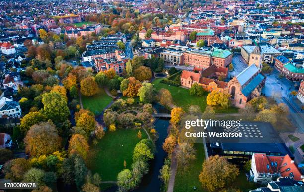 old residential district in odense surrounding public park "eventyrhaven" - "adventure garden" - odense denmark stock pictures, royalty-free photos & images