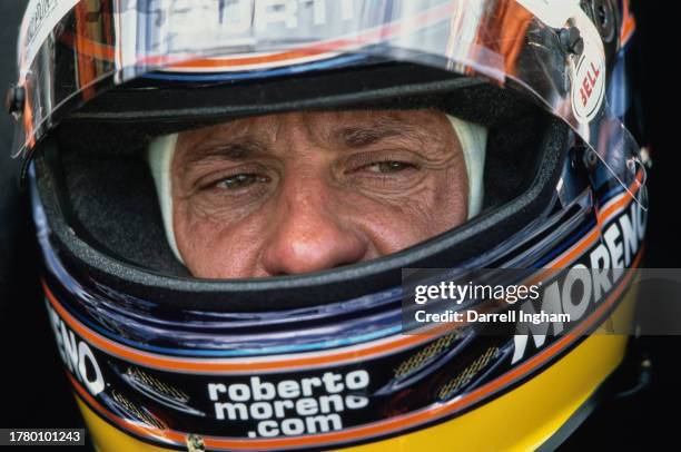 Roberto Moreno from Brazil looks out from the cockpit of the Patrick Racing Reynard 01i Toyota RV8E during practice for the Championship Auto Racing...