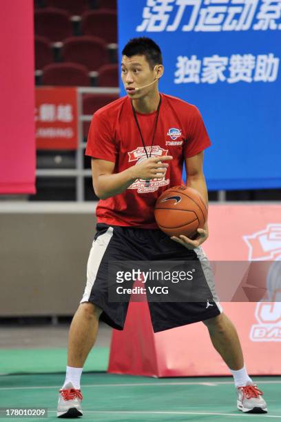 American professional basketball player Jeremy Lin of the Houston Rockets attends a basketball training camp at MasterCard Center on August 26, 2013...