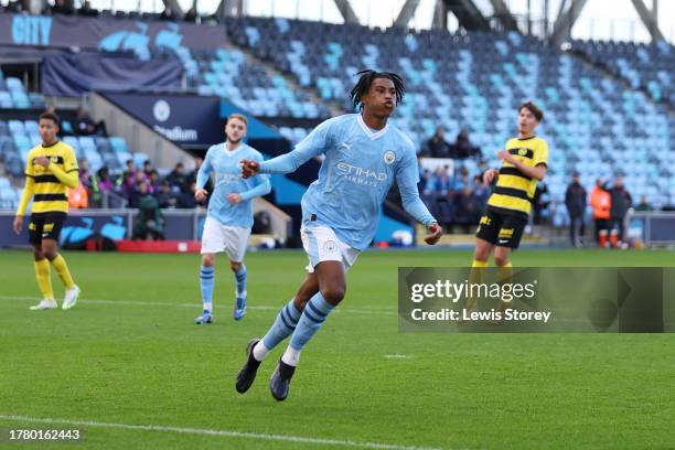 Reigan Heskey of Manchester City celebrates after scoring the team's first goal from a penalty kick during the UEFA Youth League 2023/24 match...