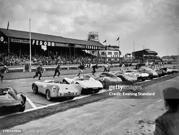 Drivers running across the track at Goodwood Circuit to start the Whitsun Trophy race, Sussex, May 24th 1958. .