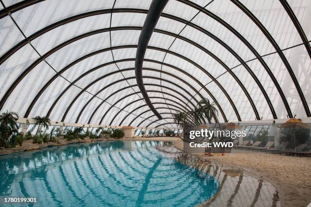 Men and women relax at an artificial beach in Khan Shatyr Mall in Astana Kazakhstan, on Feb. 20, 2018.