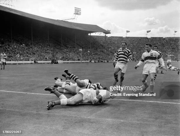 Players of the Wigan and Workington Town rugby teams in action during the Rugby League Challenge Cup final at Wembley Stadium in London, May 10th...