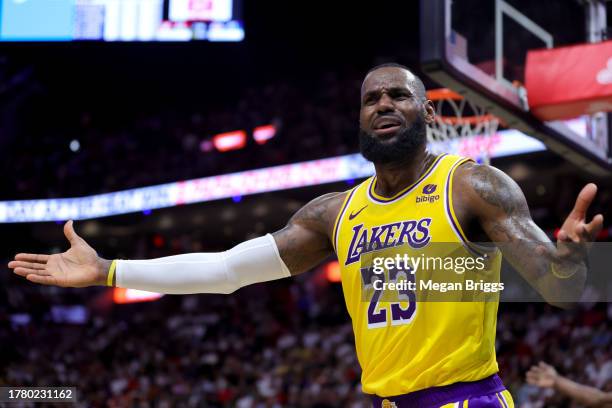 LeBron James of the Los Angeles Lakers reacts during the second quarter of the game against the Miami Heat at Kaseya Center on November 06, 2023 in...