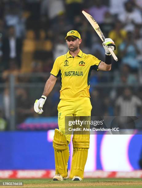 Glenn Maxwell of Australia celebrates his century during the ICC Men's Cricket World Cup India 2023 between Australia and Afghanistan at Wankhede...