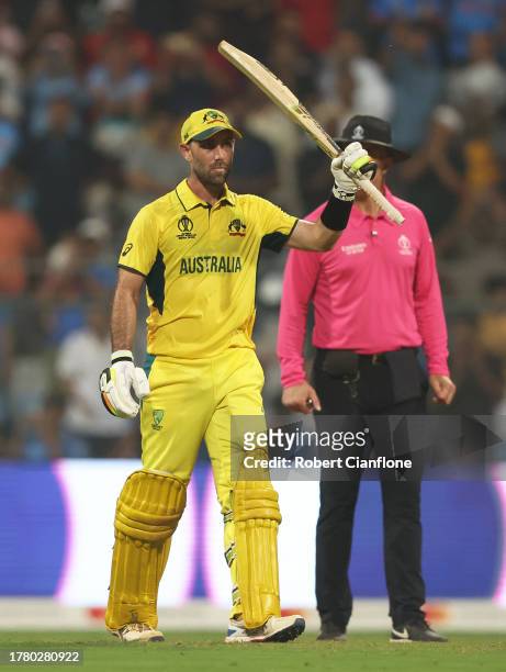 Glenn Maxwell of Australia celebrates his century during the ICC Men's Cricket World Cup India 2023 between Australia and Afghanistan at Wankhede...