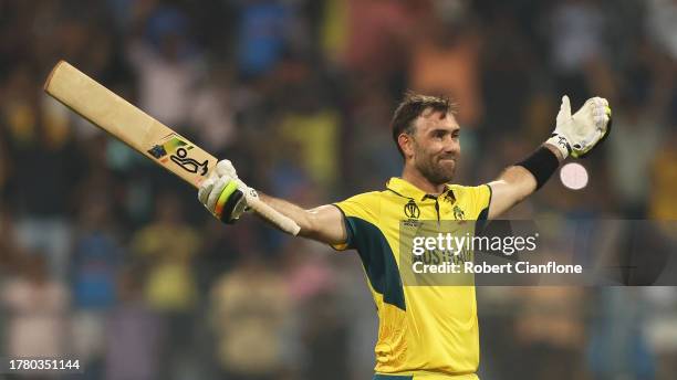 Glenn Maxwell of Australia celebrates after hitting a six for the winning runs, finishing unbeten on 201 not out during the ICC Men's Cricket World...