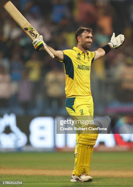 Glenn Maxwell of Australia celebrates after hitting a six for the winning runs, finishing unbeten on 201 not out during the ICC Men's Cricket World...